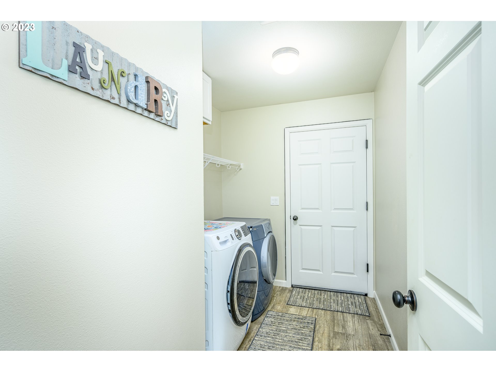 7297 Ash Street Grand Ronde, OR 97347 - Photo 22 of 33 a utility room with dryer and washer