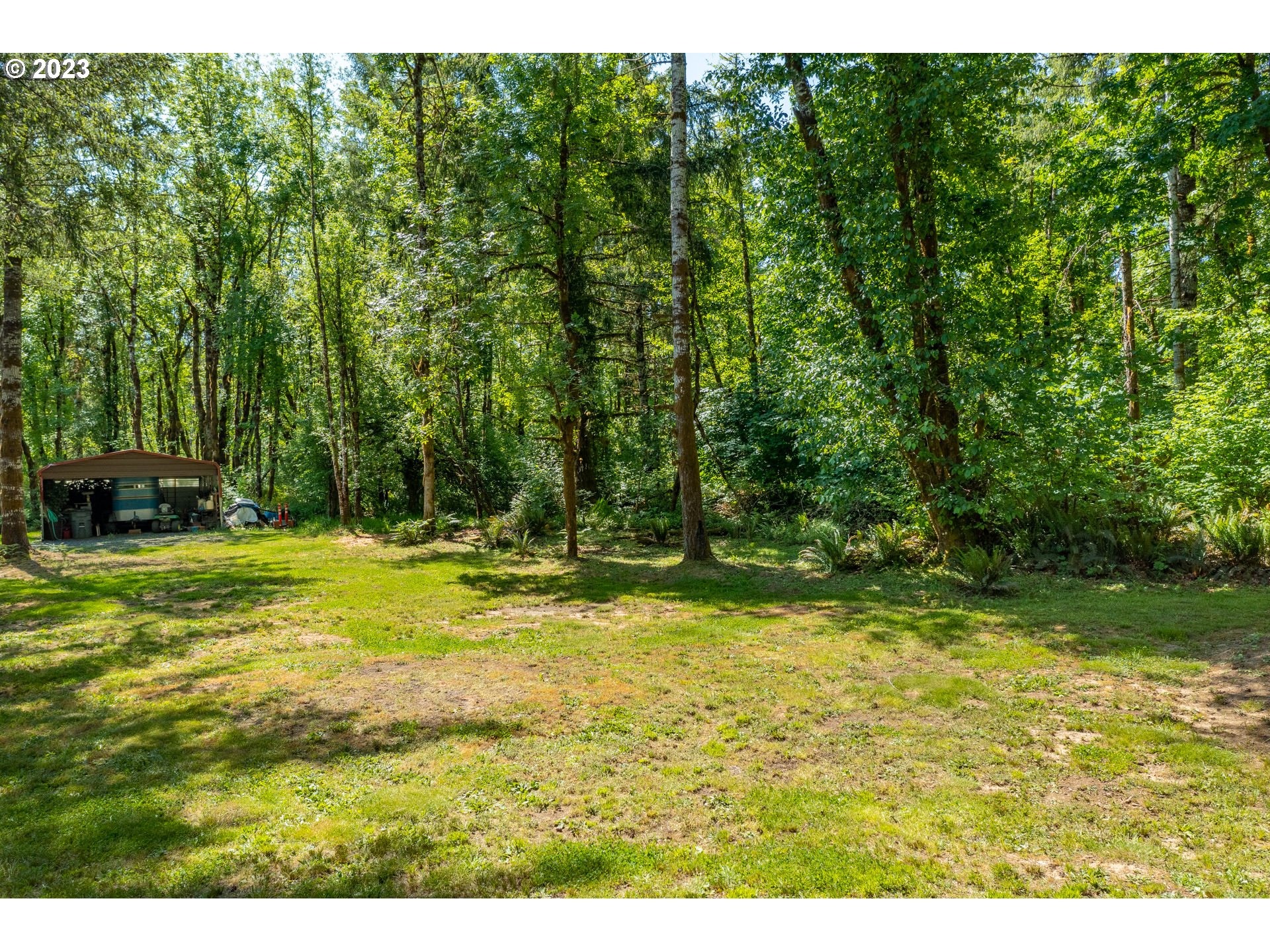 7297 Ash Street Grand Ronde, OR 97347 - Photo 30 of 33 a view of swimming pool with a yard