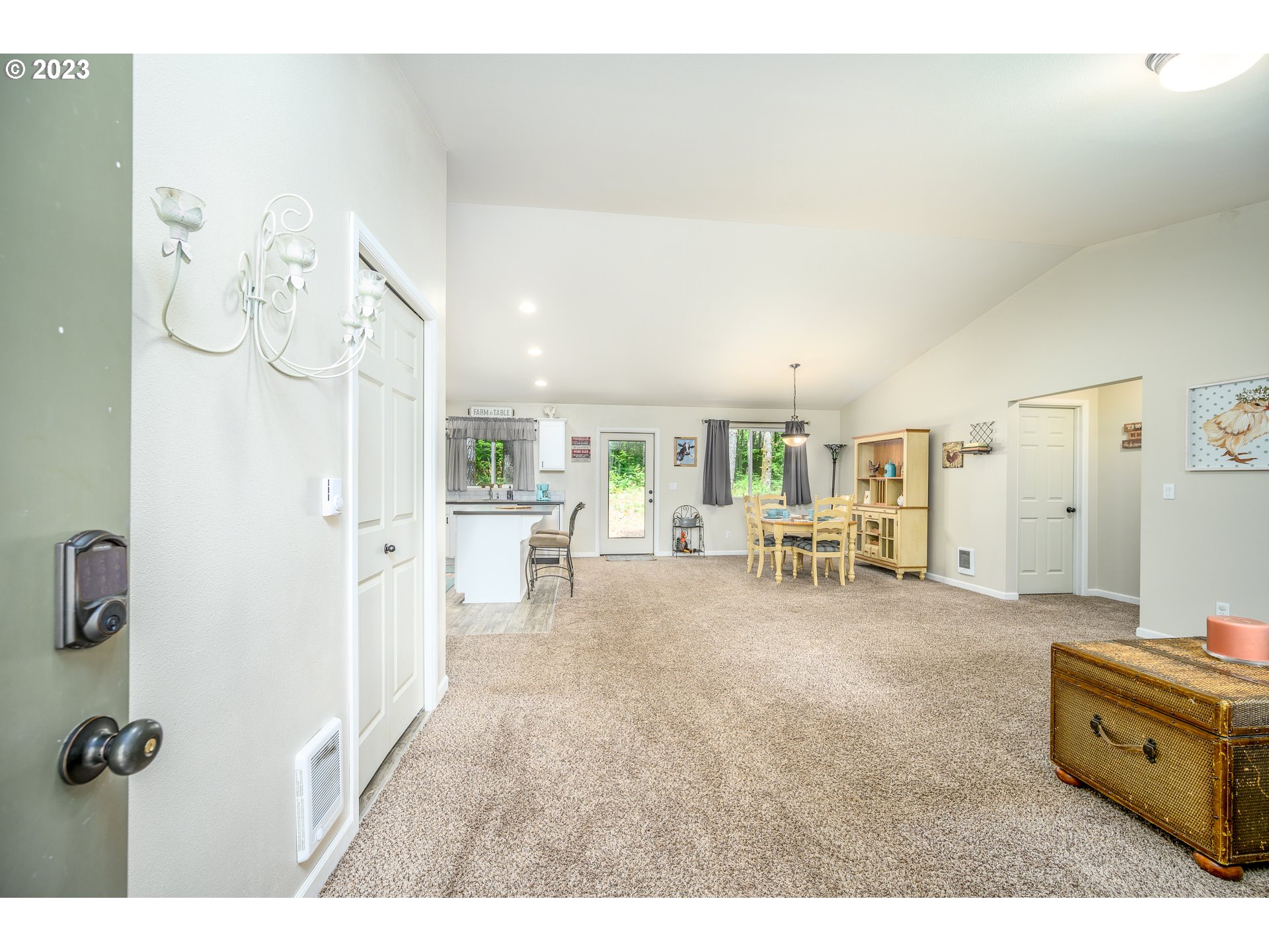 7297 Ash Street Grand Ronde, OR 97347 - Photo 3 of 33 a living room with furniture and a table