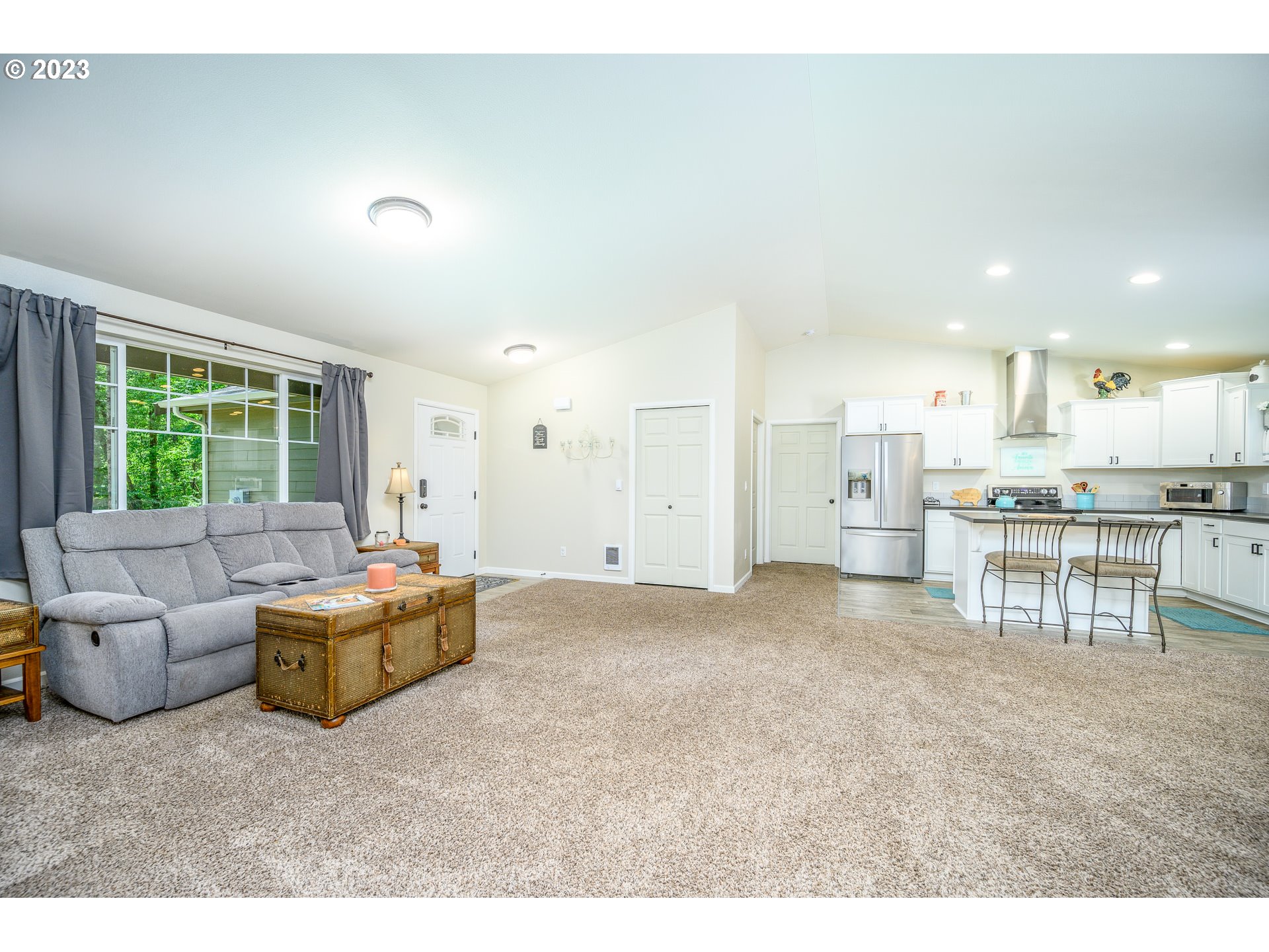7297 Ash Street Grand Ronde, OR 97347 - Photo 6 of 33 a living room with furniture and a large window