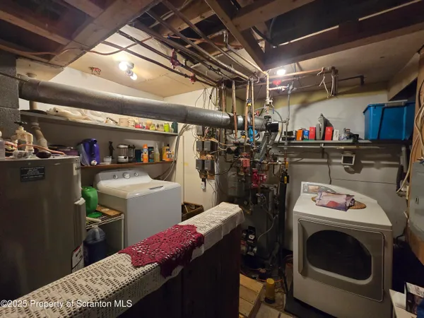 a storage room with washer and dryer