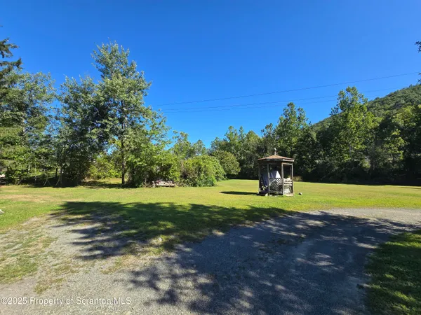 a view of a golf course with a lake view