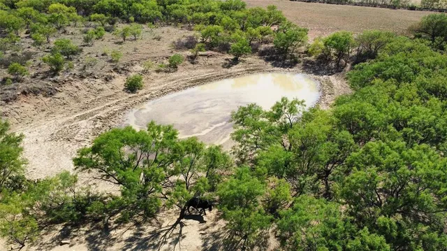 an aerial view of residential house with outdoor space