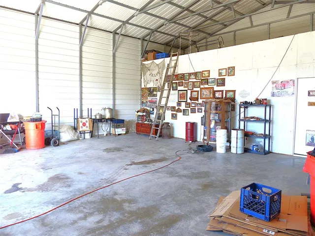 a view of a chairs and table in a room
