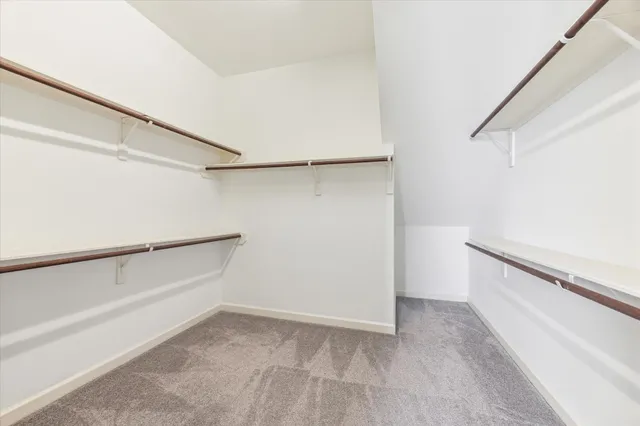 a view of an empty walk in closet