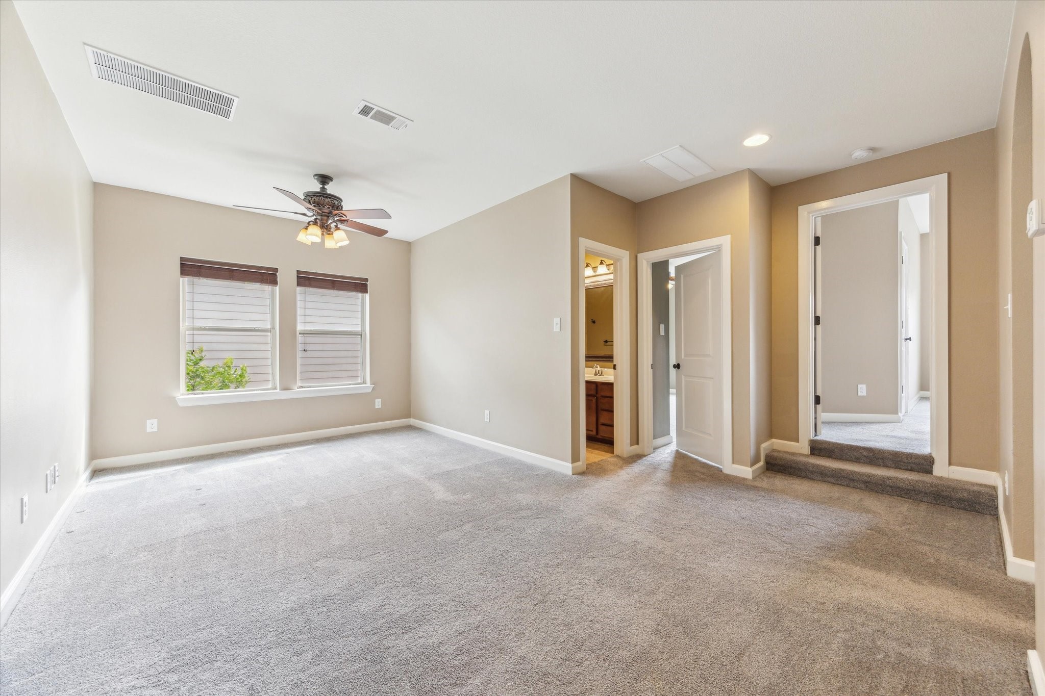 26223 Rustic Ranch Lane Katy, TX 77494 - Photo 20 of 33 an empty room with windows and closet