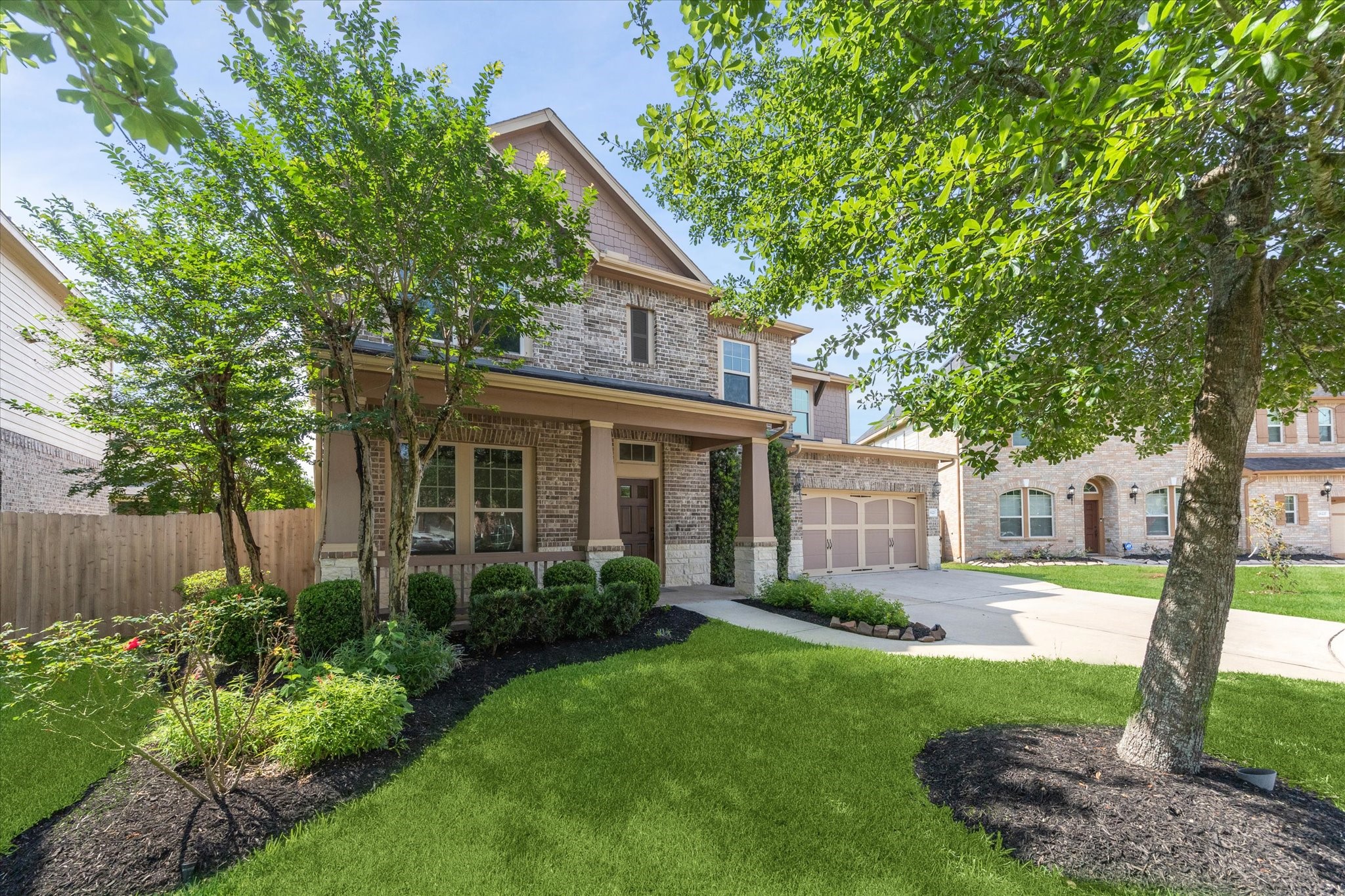 26223 Rustic Ranch Lane Katy, TX 77494 - Photo 2 of 33 a front view of a house with garden