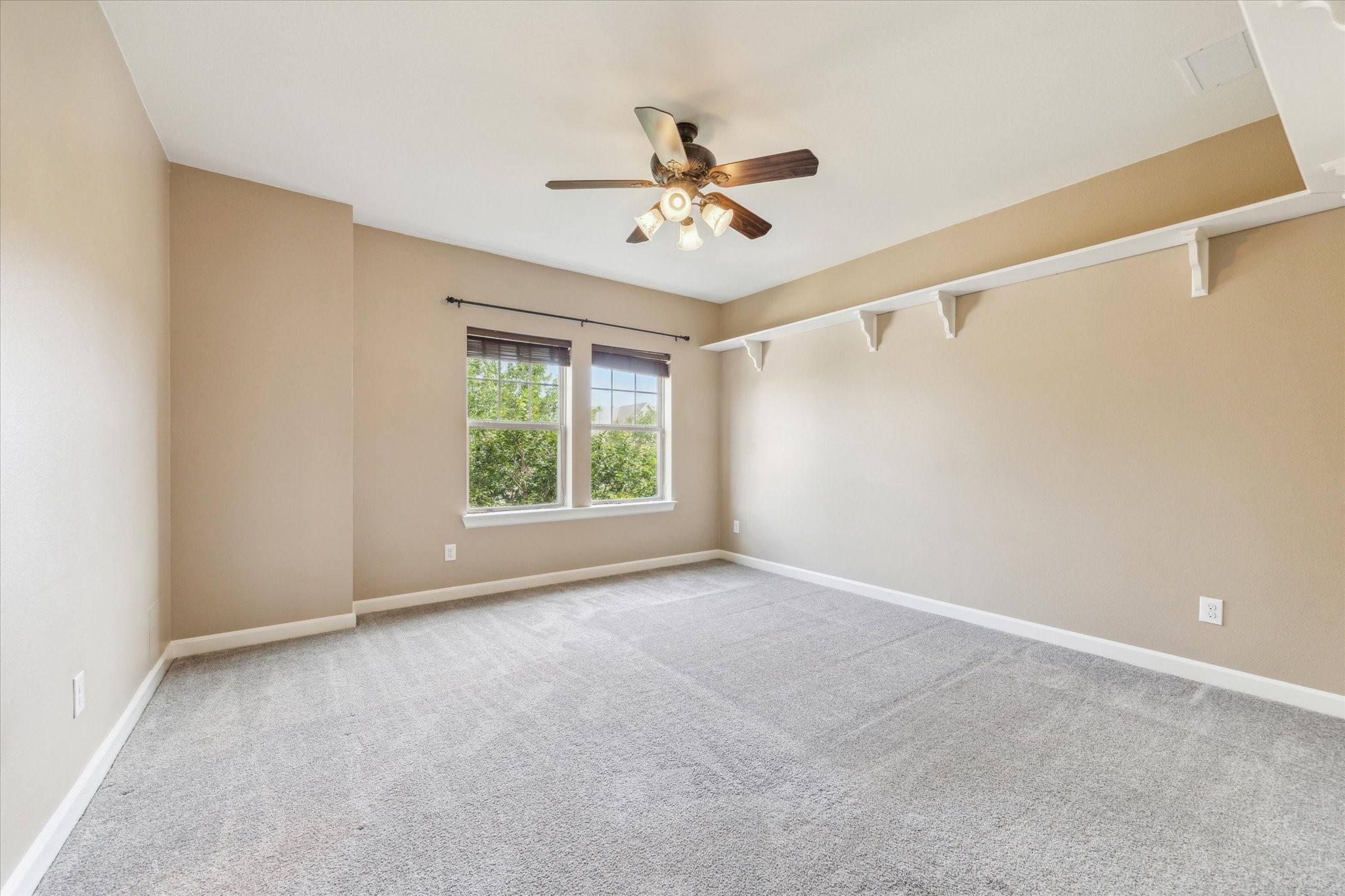 26223 Rustic Ranch Lane Katy, TX 77494 - Photo 22 of 33 a view of an empty room with a window