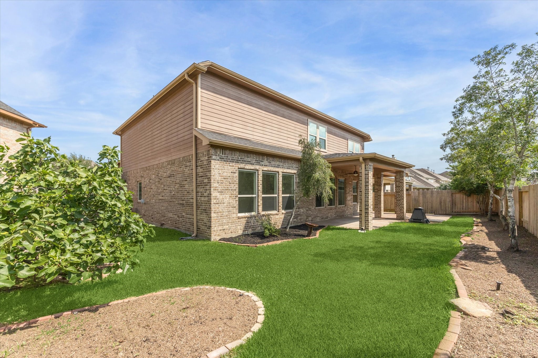 26223 Rustic Ranch Lane Katy, TX 77494 - Photo 28 of 33 a view of a house with a yard