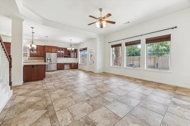 a view of a kitchen with furniture and a kitchen