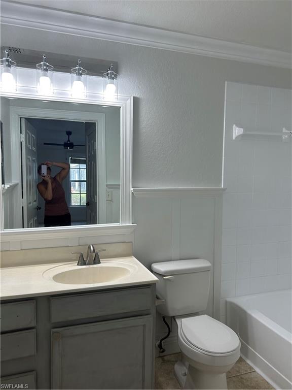14885 Pleasant Bay Lane, Unit 4104 Naples, FL 34119 - Photo 13 of 17 a bathroom with a sink mirror vanity and toilet