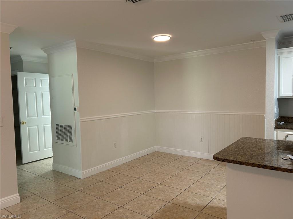 14885 Pleasant Bay Lane, Unit 4104 Naples, FL 34119 - Photo 8 of 17 an empty room with closet