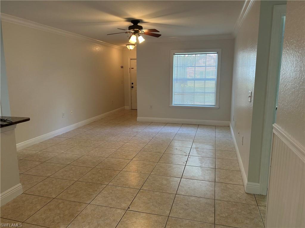14885 Pleasant Bay Lane, Unit 4104 Naples, FL 34119 - Photo 10 of 17 a view of an empty room with a window