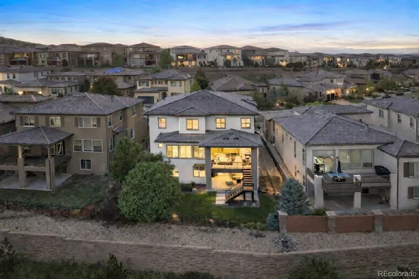 an aerial view of a house with a garden
