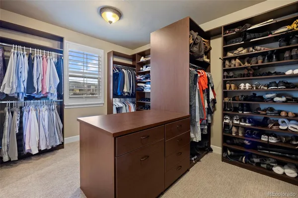 a bathroom with a tub and shower