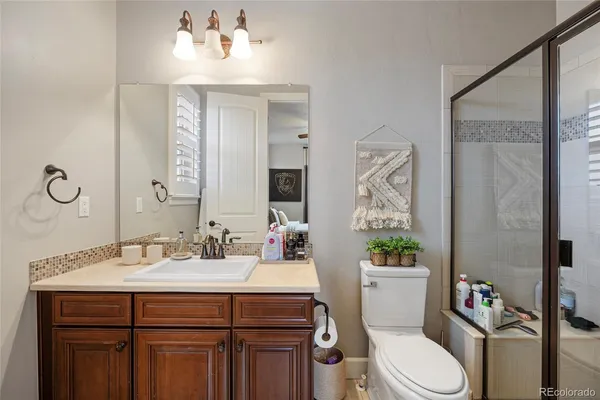 a utility room with sink dryer and washer