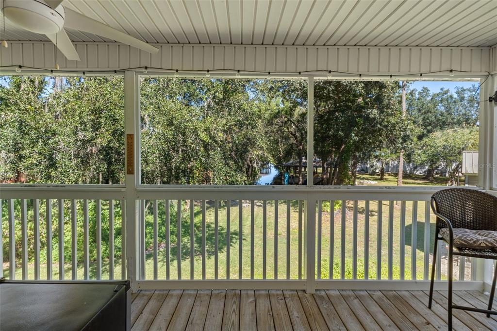 5890 South Mason Creek Road Homosassa, FL 34448 - Photo 27 of 50 a view of a balcony with wooden floor