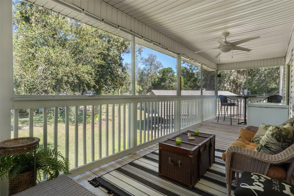 5890 South Mason Creek Road Homosassa, FL 34448 - Photo 29 of 50 a view of a balcony with furniture