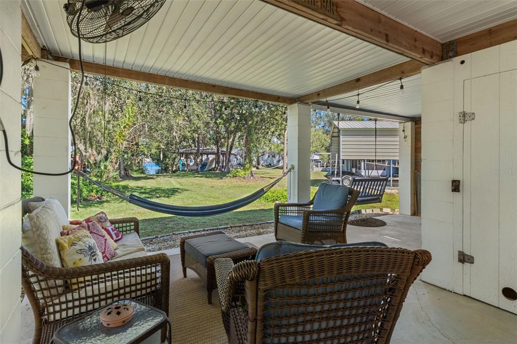 5890 South Mason Creek Road Homosassa, FL 34448 - Photo 34 of 50 a view of a patio in the backyard