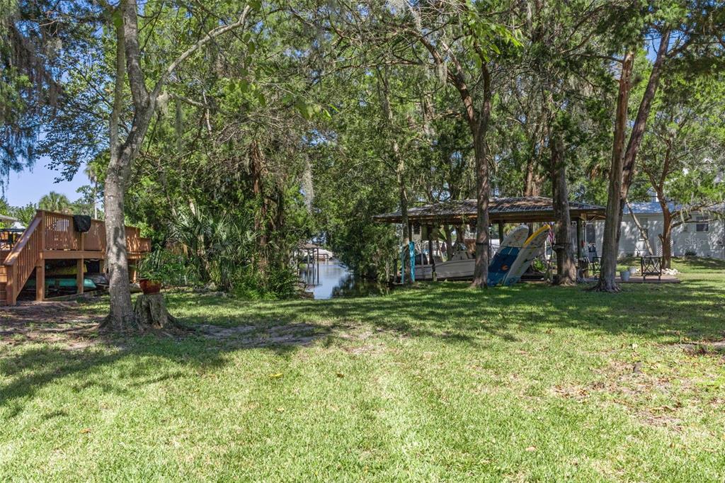 5890 South Mason Creek Road Homosassa, FL 34448 - Photo 38 of 50 a view of a park with large trees