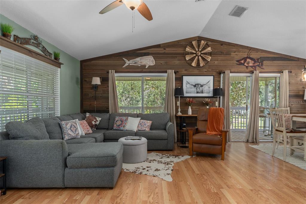 5890 South Mason Creek Road Homosassa, FL 34448 - Photo 10 of 50 a living room with furniture and a large window