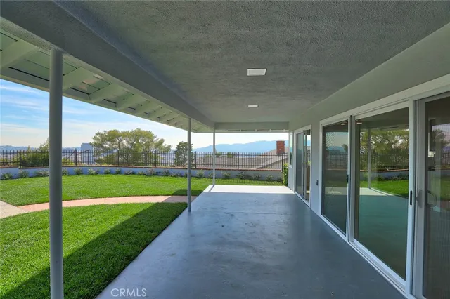 a view of swimming pool with a yard