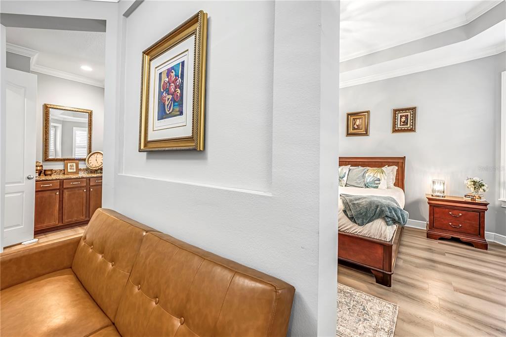 4081 Southern Valley Loop Brooksville, FL 34601 - Photo 24 of 64 a bedroom with a bed and wooden floor