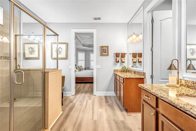 a bedroom with furniture and a baby crib