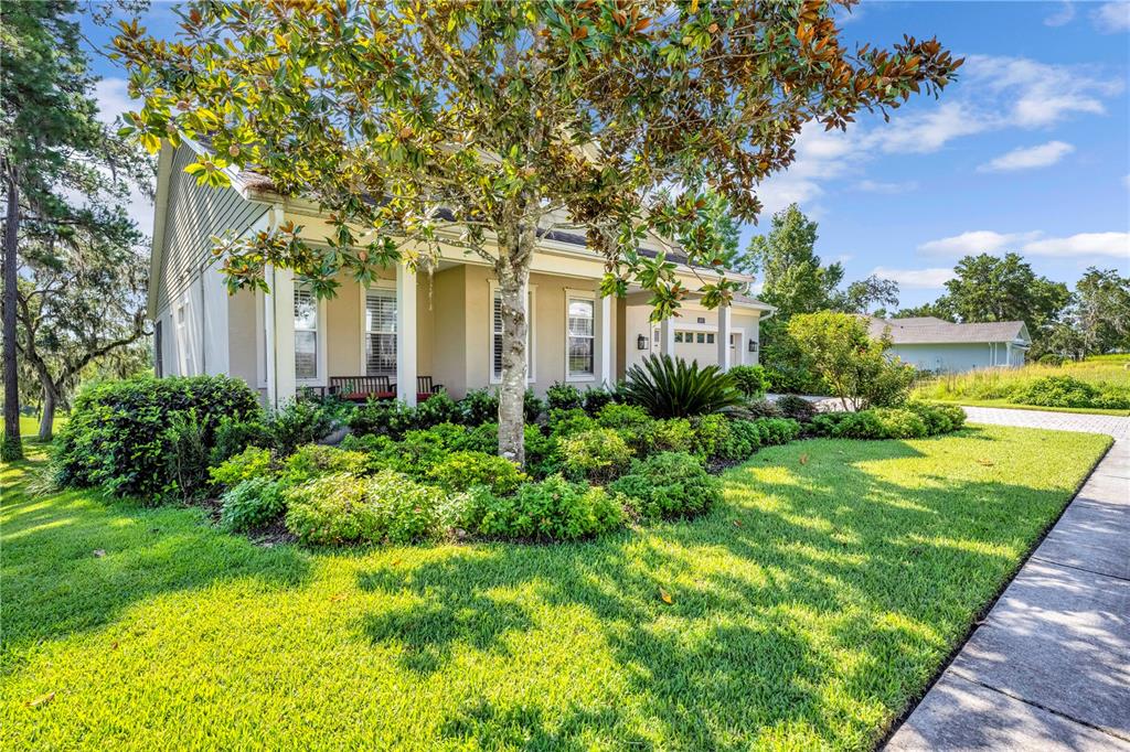 4081 Southern Valley Loop Brooksville, FL 34601 - Photo 62 of 64 a front view of a house with garden