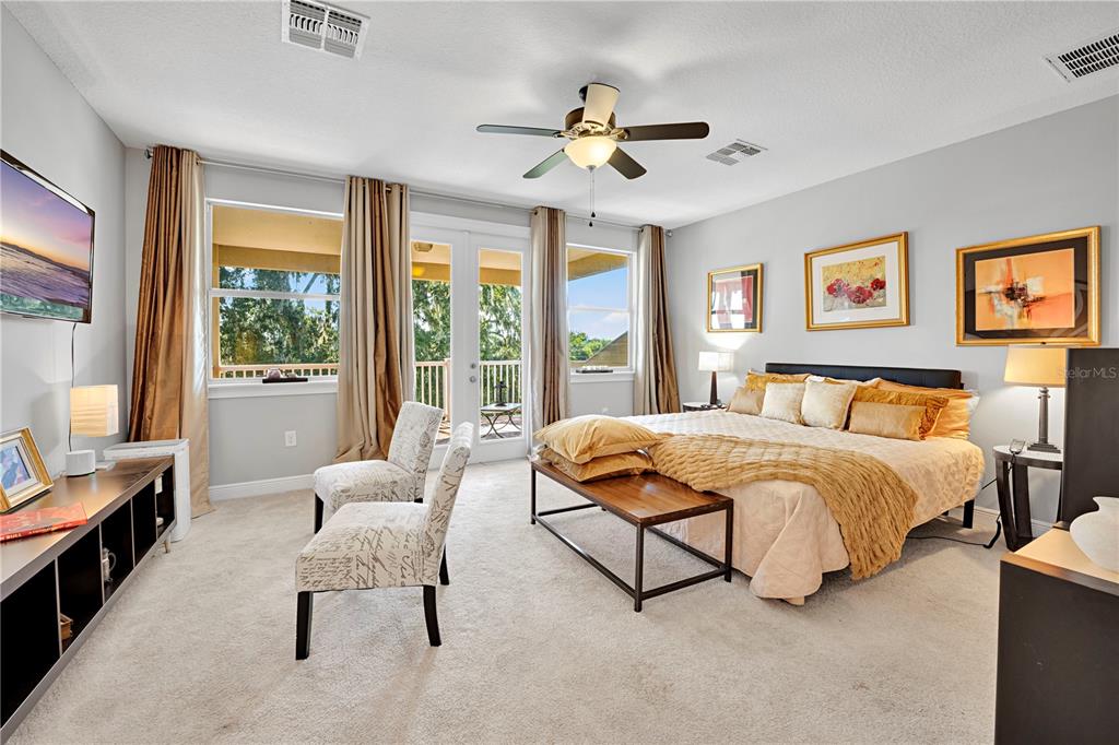 4081 Southern Valley Loop Brooksville, FL 34601 - Photo 7 of 64 a bedroom with a bed and a large window