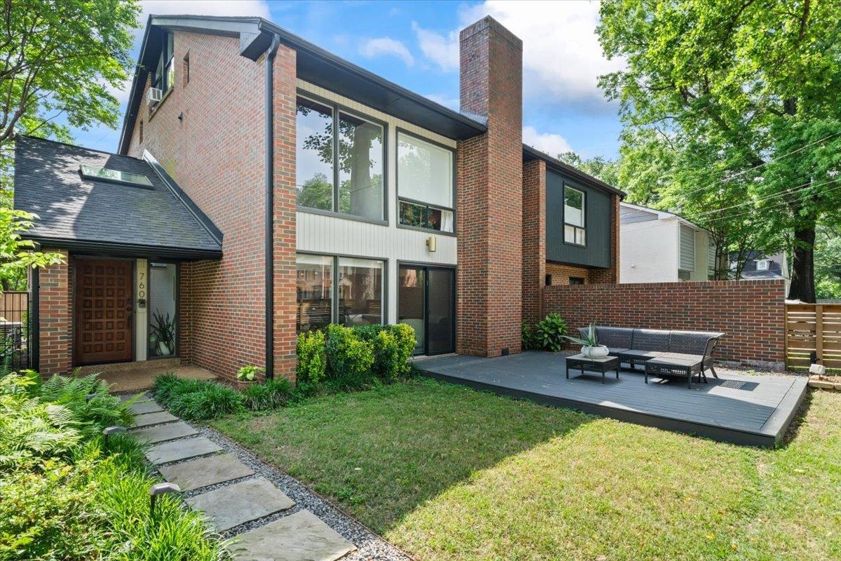 760 Roland Street Memphis, TN 38104 - Photo 1 of 29 a view of a house with backyard and sitting area