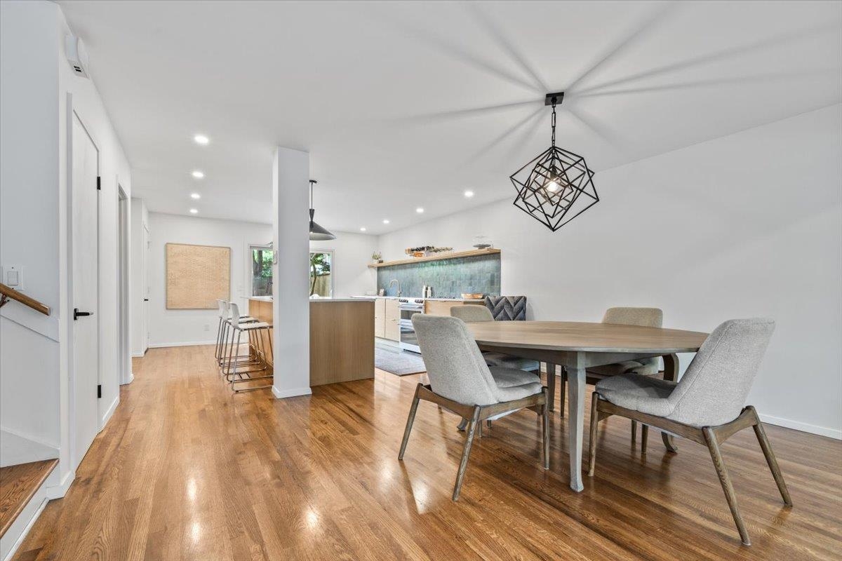760 Roland Street Memphis, TN 38104 - Photo 12 of 29 a view of a dining room with furniture wooden floor and a chandelier