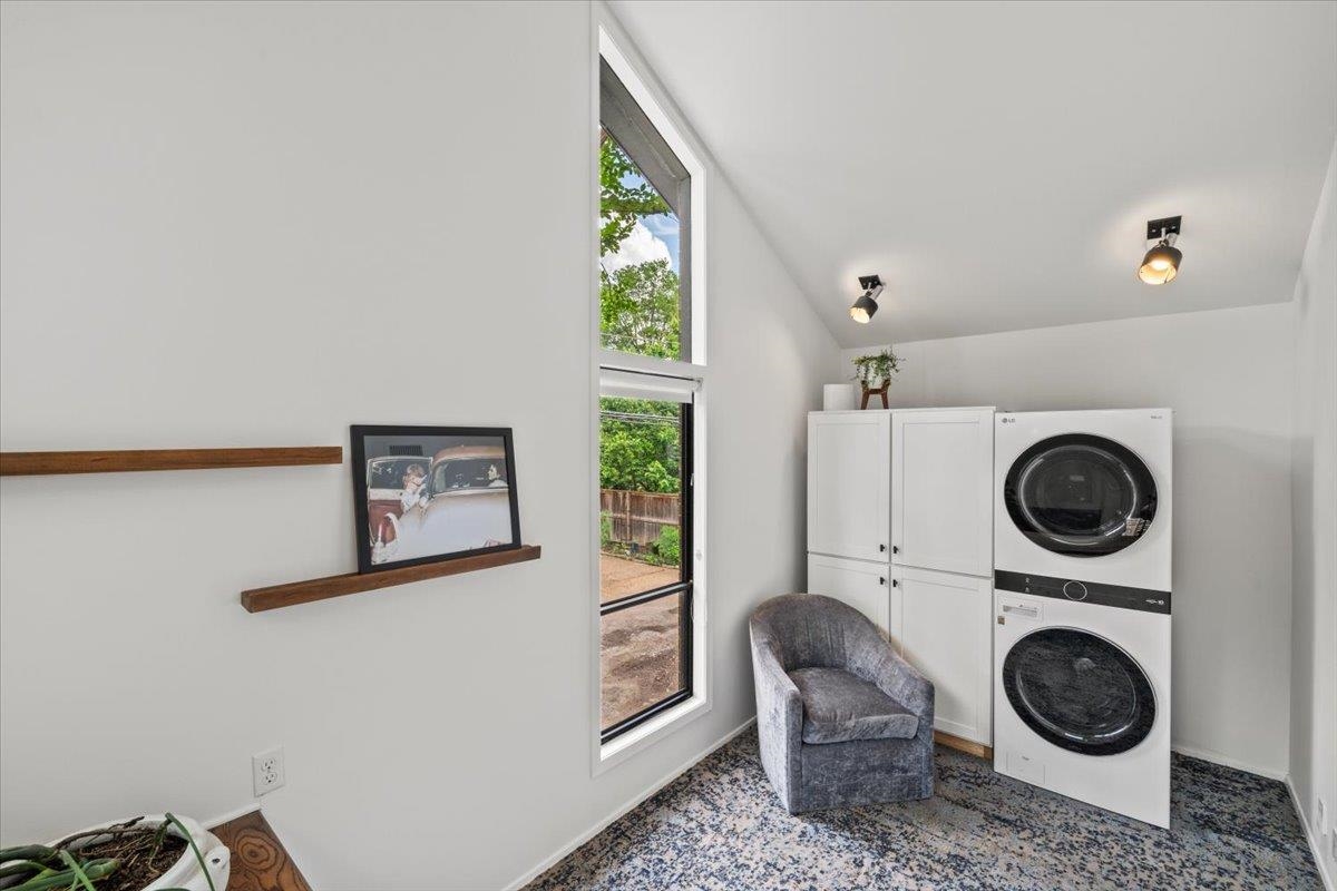 760 Roland Street Memphis, TN 38104 - Photo 13 of 29 a view of a storage and utility room with washer and dryer
