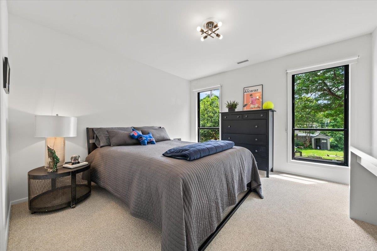 760 Roland Street Memphis, TN 38104 - Photo 19 of 29 a bedroom with a bed and a large window