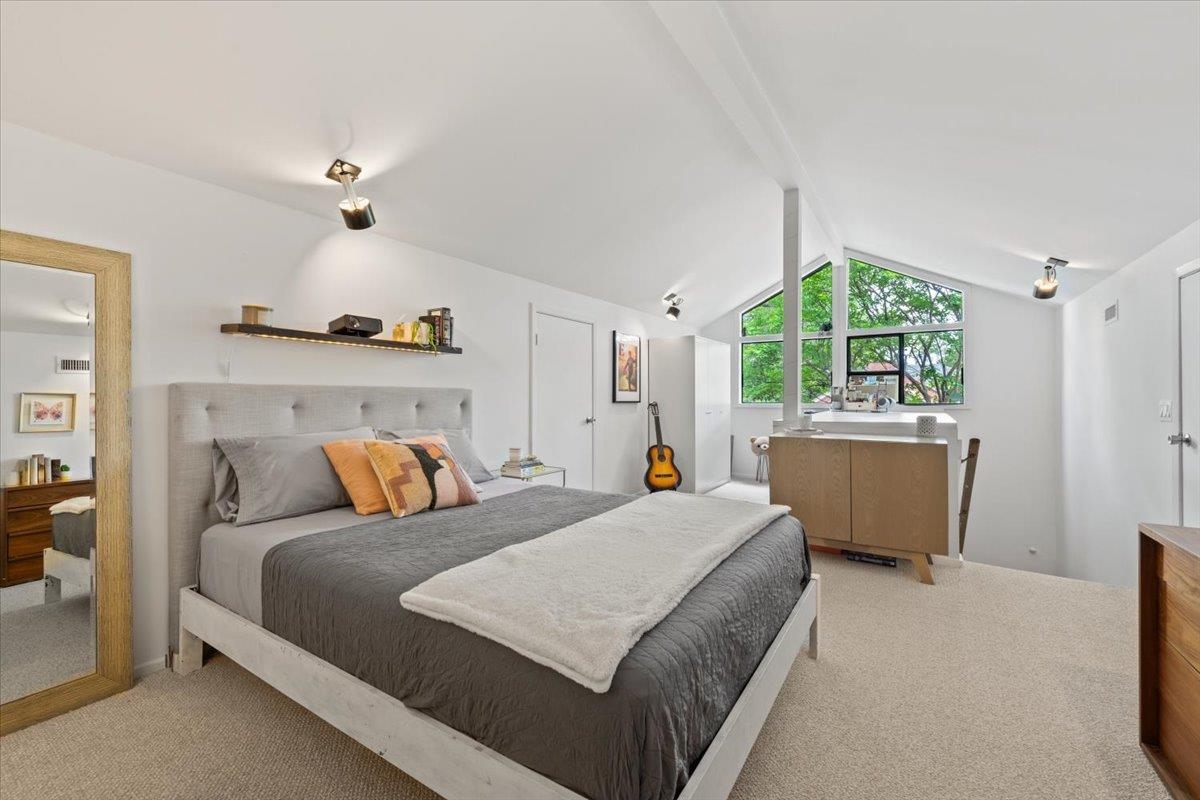 760 Roland Street Memphis, TN 38104 - Photo 22 of 29 a bedroom with a bed and a window