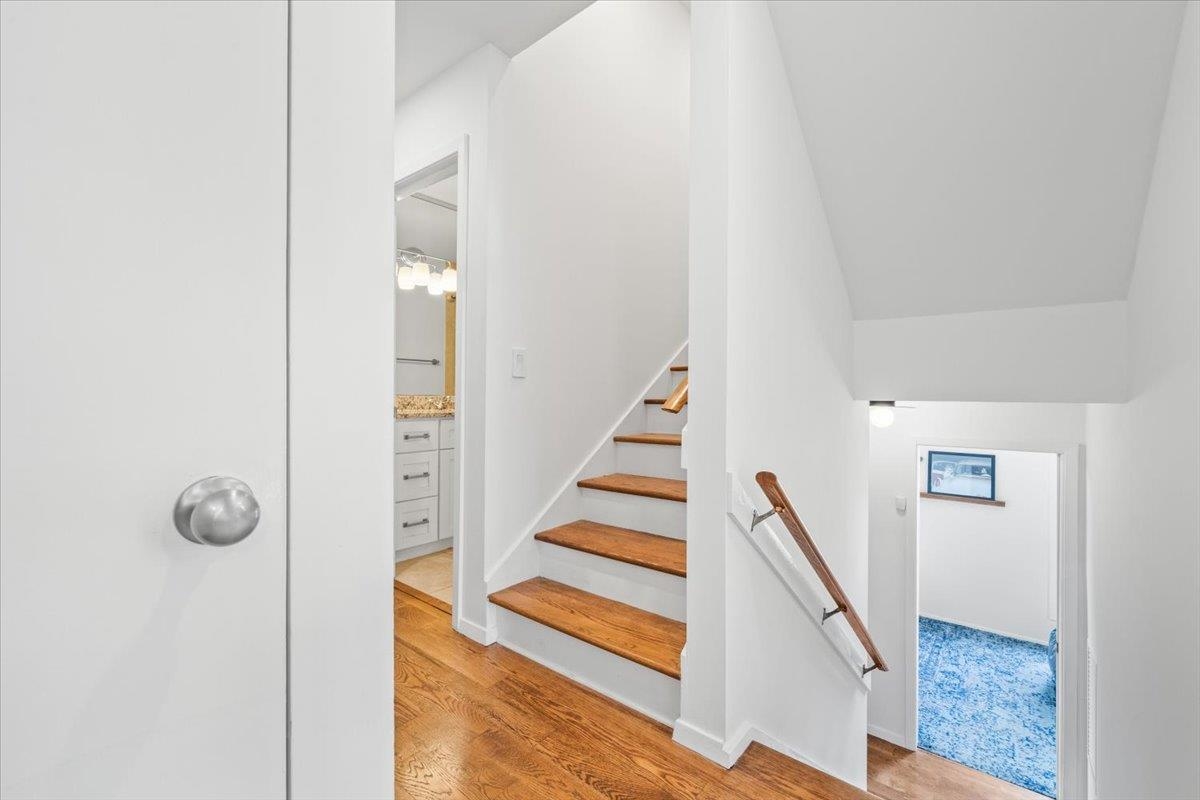 760 Roland Street Memphis, TN 38104 - Photo 24 of 29 a view of a hallway with wooden floor and staircase