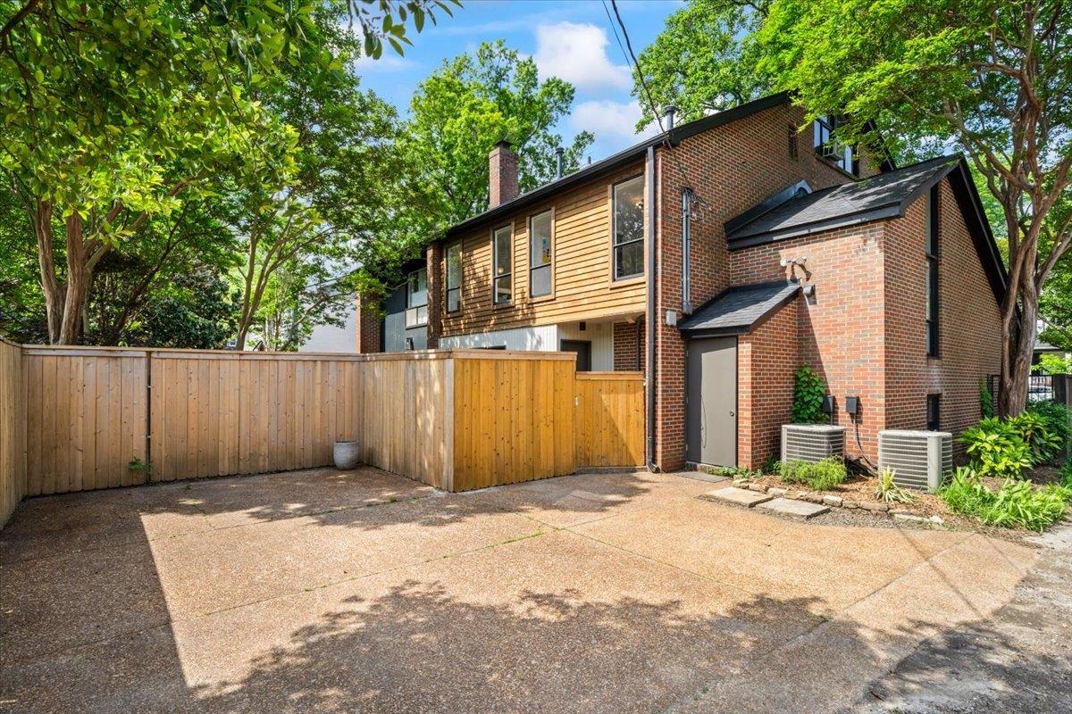760 Roland Street Memphis, TN 38104 - Photo 28 of 29 a front view of a house with a yard