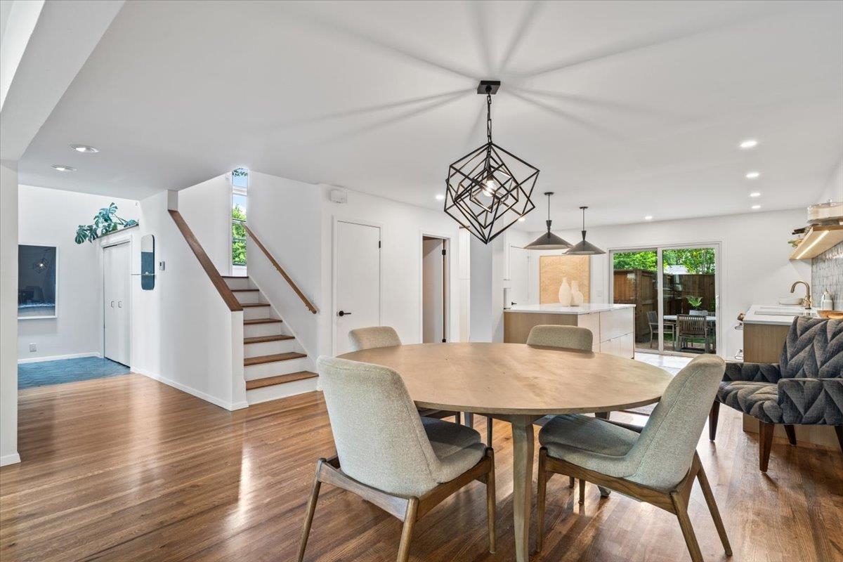760 Roland Street Memphis, TN 38104 - Photo 7 of 29 a view of a dining room with furniture a chandelier and wooden floor
