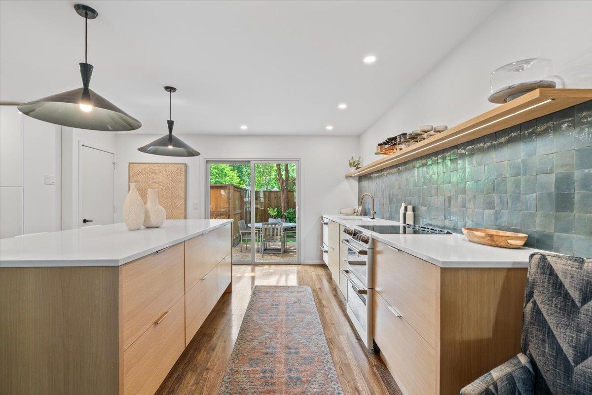 760 Roland Street Memphis, TN 38104 - Photo 8 of 29 a kitchen with sink stove and refrigerator
