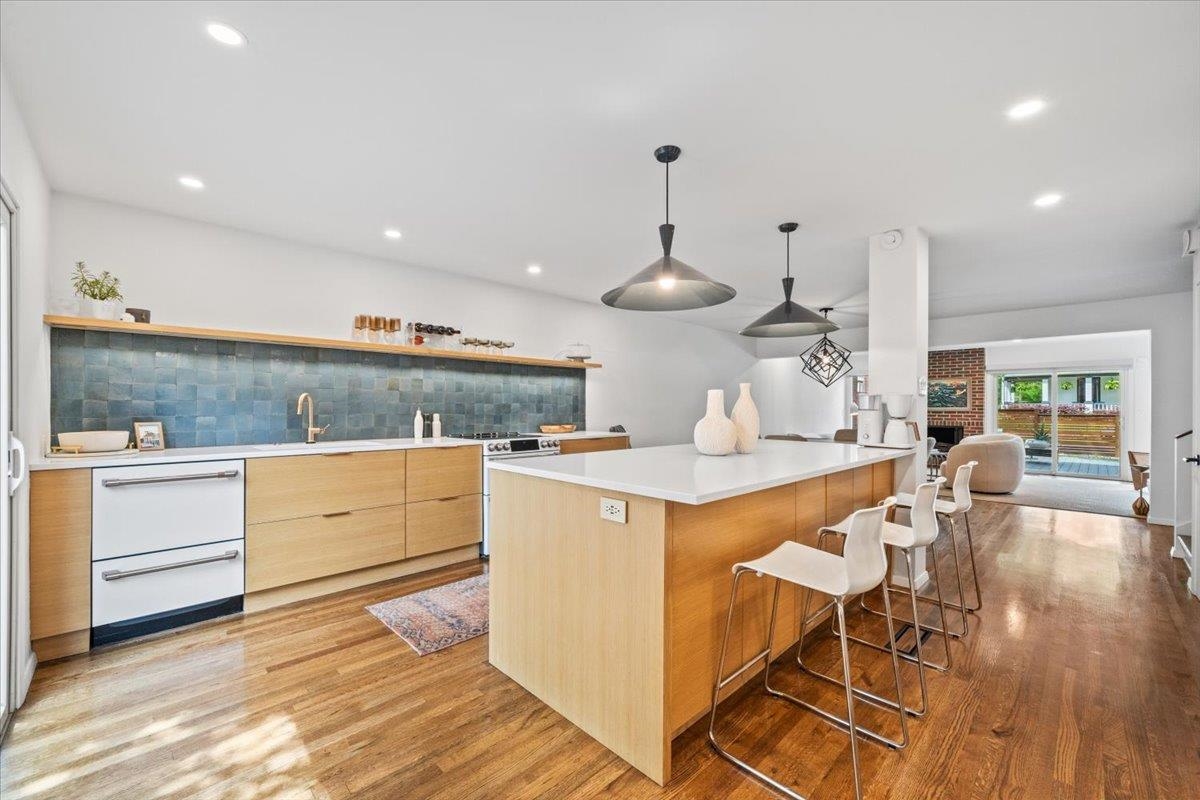 760 Roland Street Memphis, TN 38104 - Photo 10 of 29 a kitchen with stainless steel appliances a sink and stove