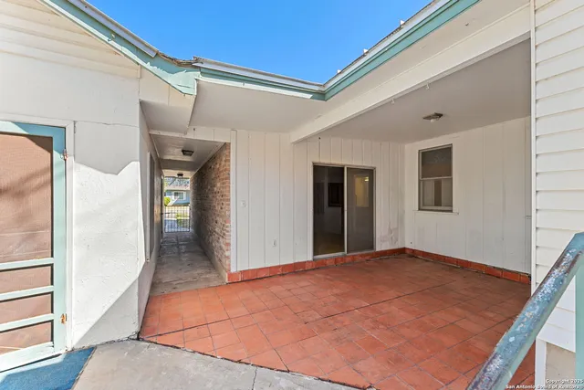 a house with trees in front of it
