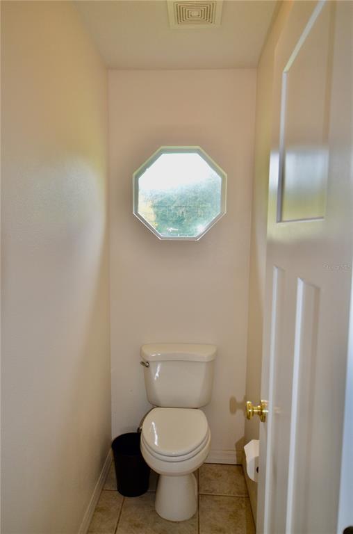 4708 Southwest 73rd Trail Lake Butler, FL 32054 - Photo 30 of 83 a bathroom with a toilet and a sink