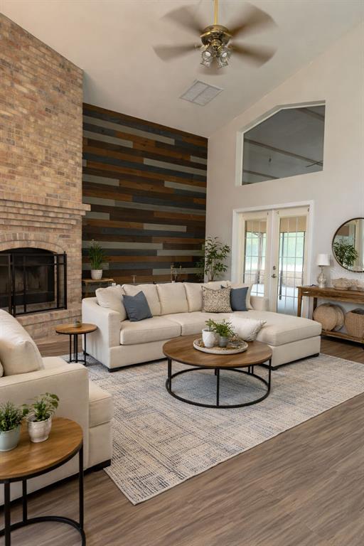 4708 Southwest 73rd Trail Lake Butler, FL 32054 - Photo 37 of 83 a living room with furniture and a fireplace