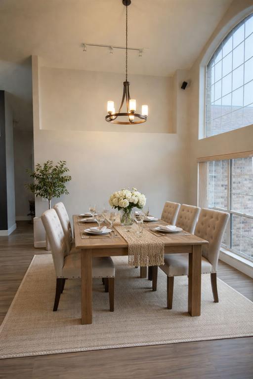 4708 Southwest 73rd Trail Lake Butler, FL 32054 - Photo 41 of 83 a view of a dining room with furniture window and wooden floor