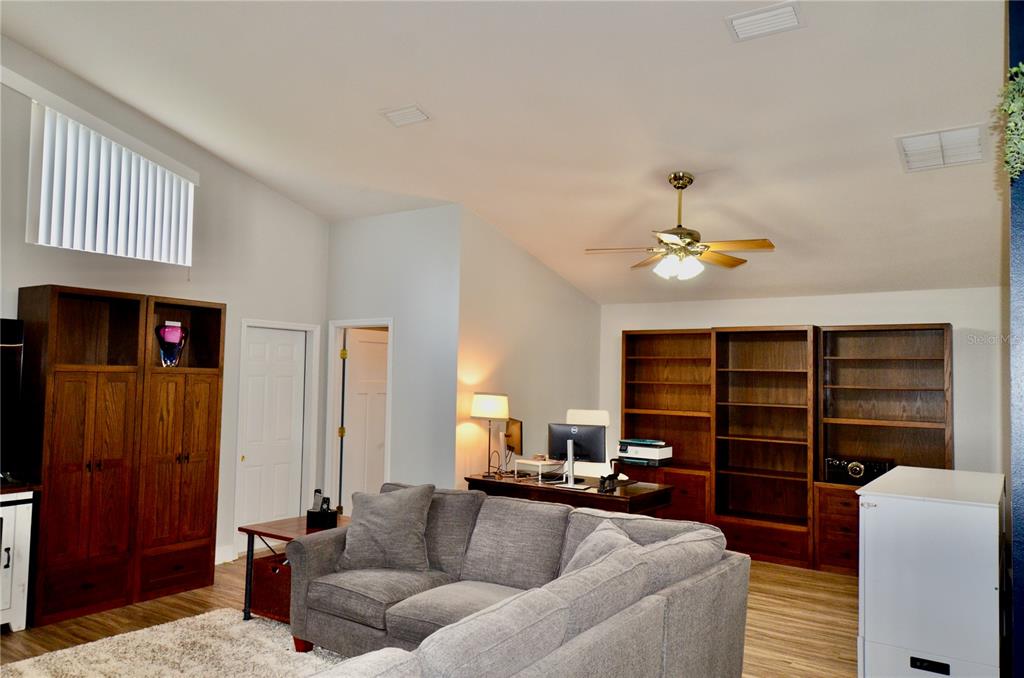 4708 Southwest 73rd Trail Lake Butler, FL 32054 - Photo 64 of 83 a living room with furniture and a window