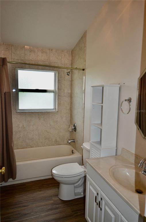 4708 Southwest 73rd Trail Lake Butler, FL 32054 - Photo 70 of 83 a bathroom with a granite countertop bathtub shower sink vanity and toilet