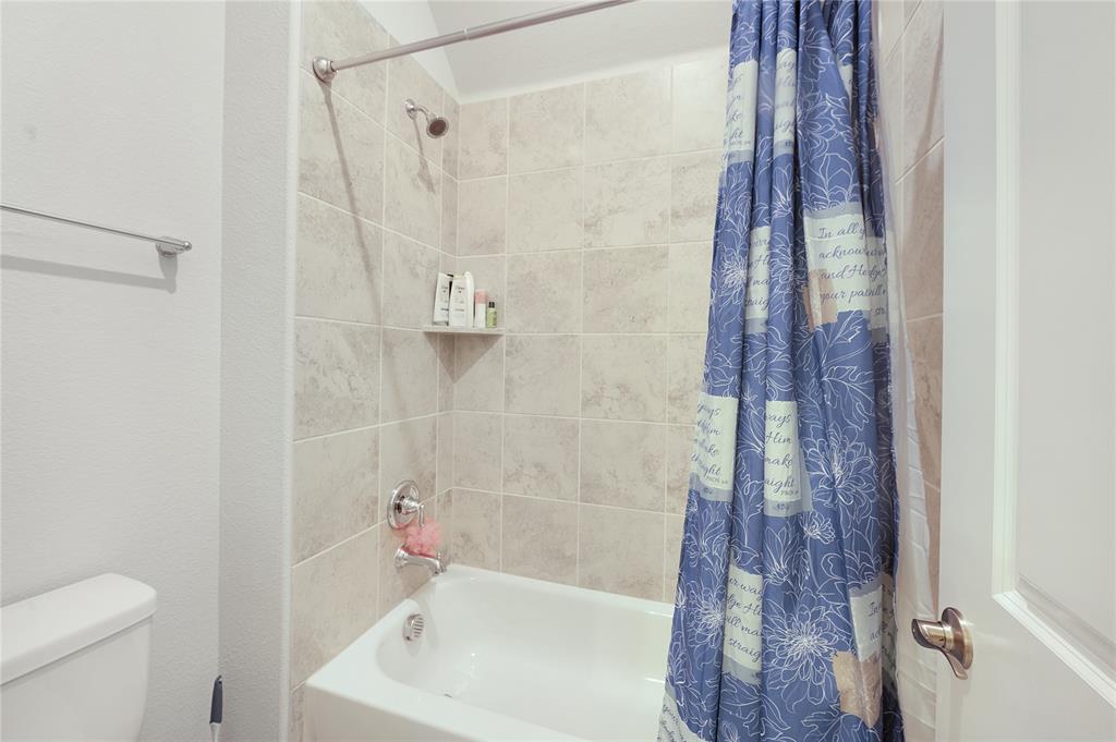 1510 Chisholm Trail Prosper, TX 75078 - Photo 25 of 32 a bathroom with a shower and a toilet