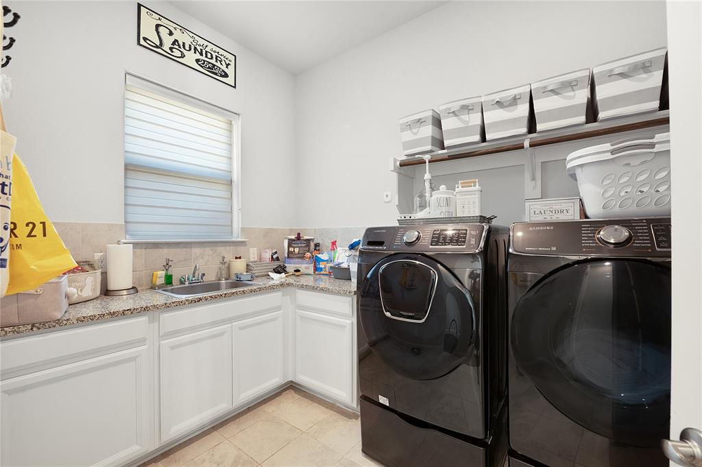 1510 Chisholm Trail Prosper, TX 75078 - Photo 27 of 32 a utility room with sink dryer and washer
