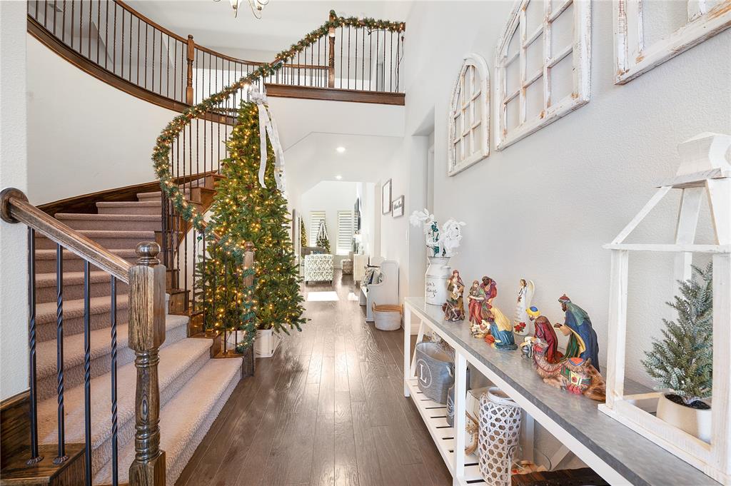 1510 Chisholm Trail Prosper, TX 75078 - Photo 6 of 32 a view of entryway and hall with wooden floor