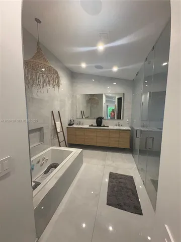 a bathroom with a shower and a toilet